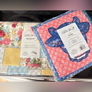 Pioneer Woman trivets and table runner. Brand new in pkg. 4 fabric trivets.